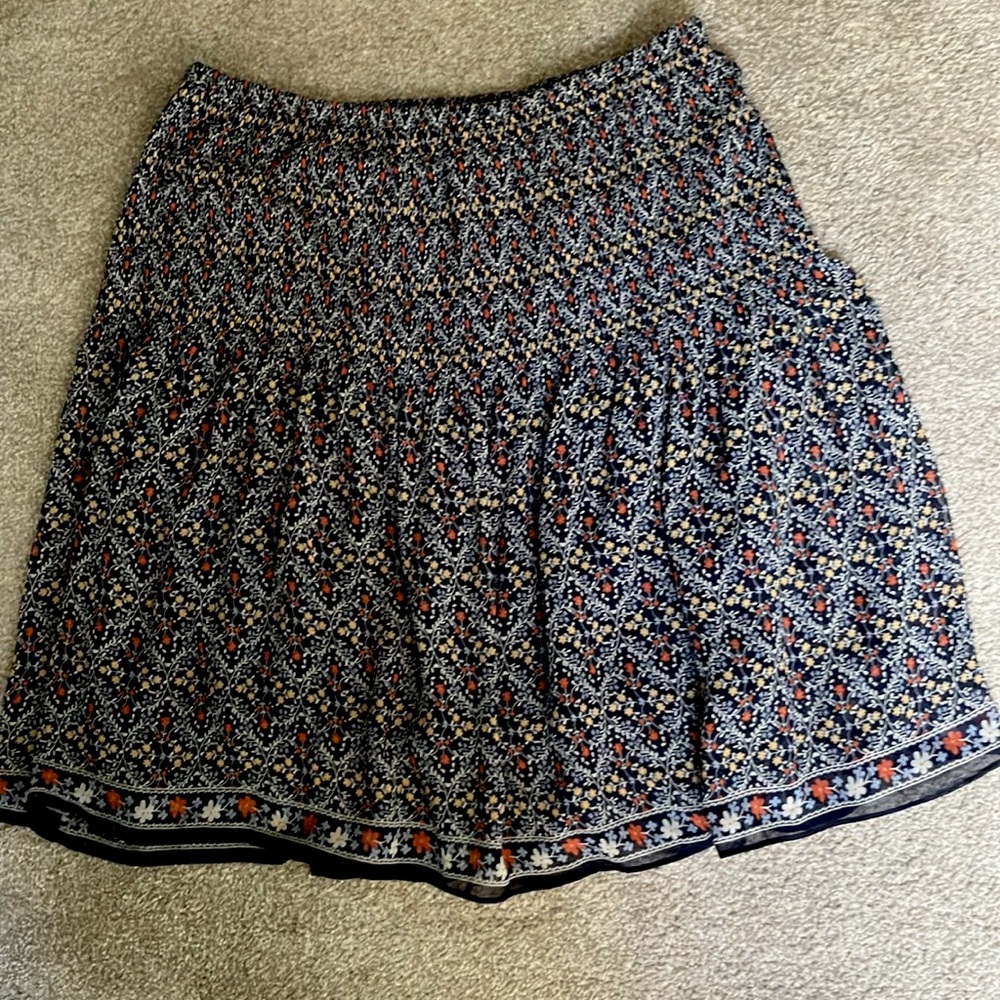 Woman’s Max Studio mini skirt floral lined elastic waist blue rust gold size S